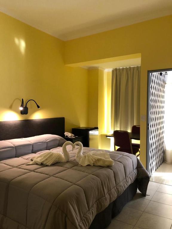 Postel nebo postele na pokoji v ubytování Posada Relmú