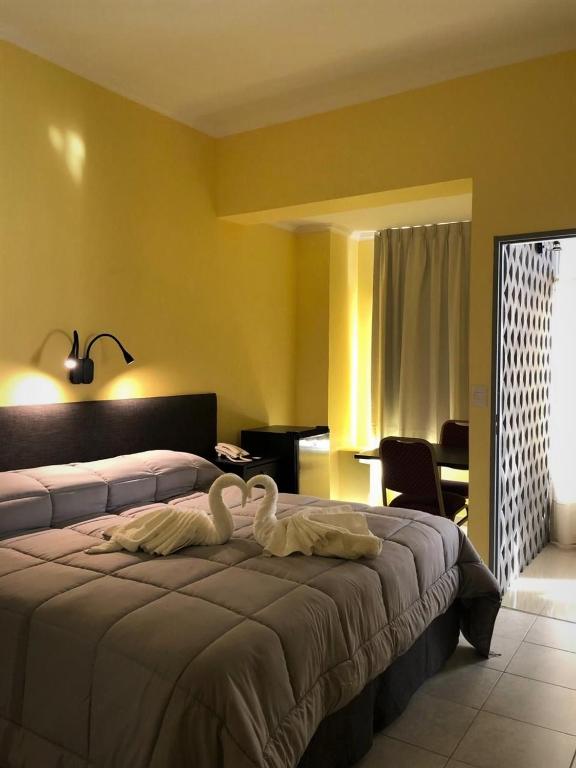 Postel nebo postele na pokoji v ubytování Posada Relmú