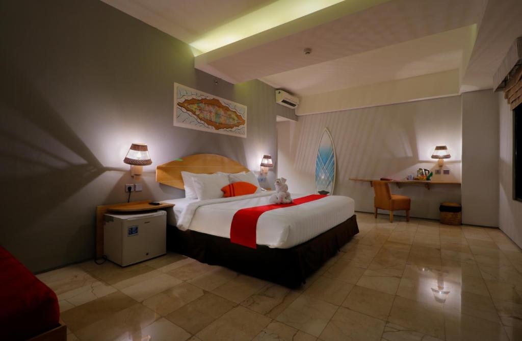 Postel nebo postele na pokoji v ubytování Koa D Surfer Hotel