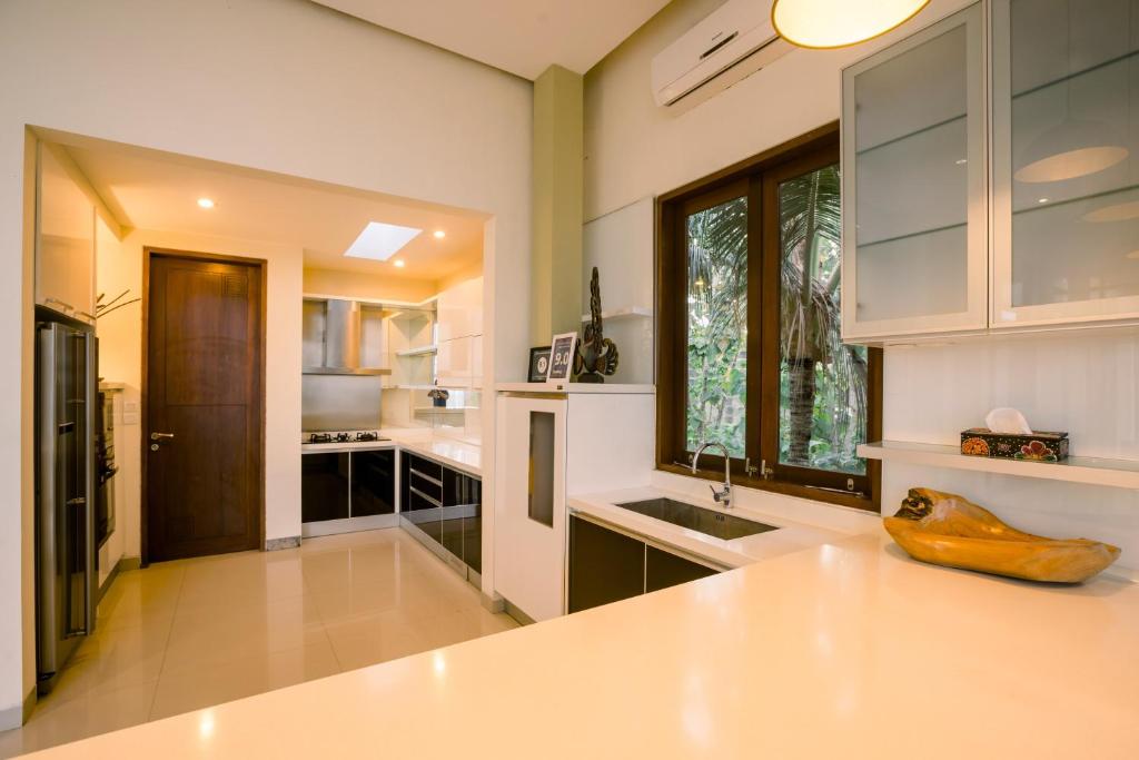 Kuchyň nebo kuchyňský kout v ubytování Jimbaran Sea View Villa