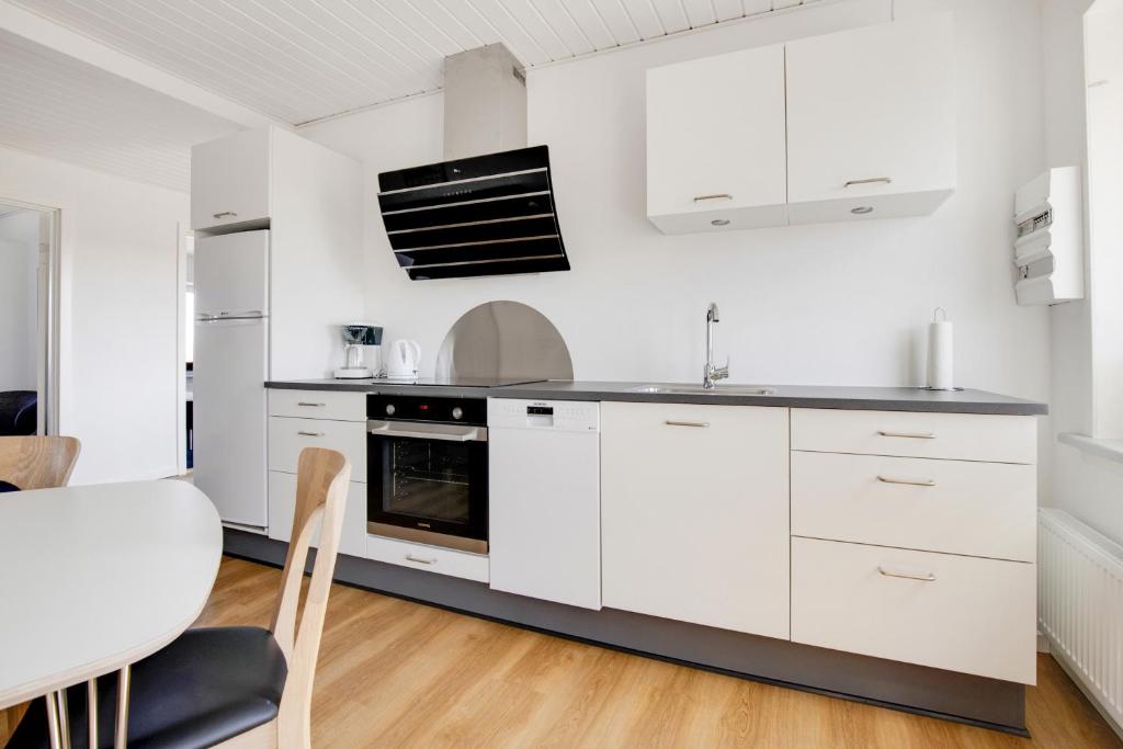 Kuchyň nebo kuchyňský kout v ubytování Hotel Litorina Appartements