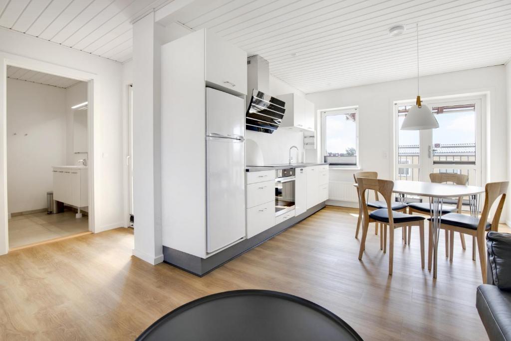 Kuchyň nebo kuchyňský kout v ubytování Hotel Litorina Appartements