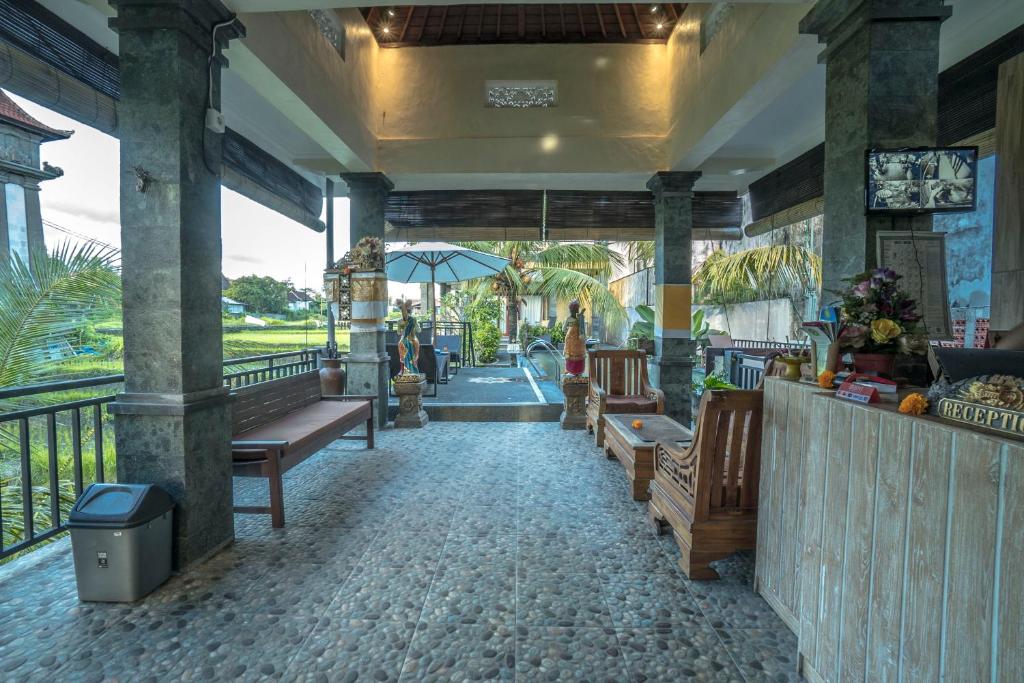 Restaurace v ubytování Adi Bisma Inn by Mahaputra-CHSE Certified
