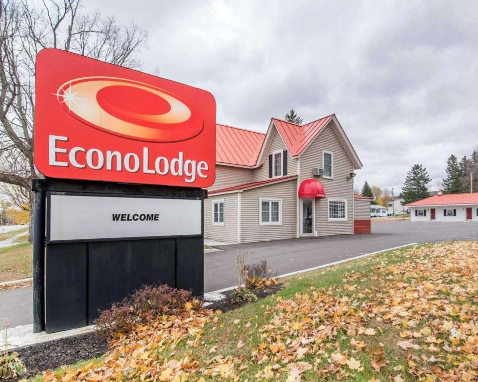a coca cola sign in front of a building at Econo Lodge in Saint Albans
