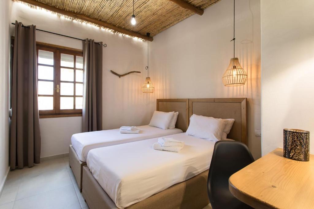 Postel nebo postele na pokoji v ubytování Ilias Apartments