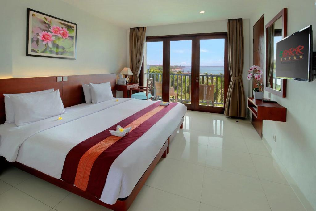 Postel nebo postele na pokoji v ubytování Bali Relaxing Resort and Spa