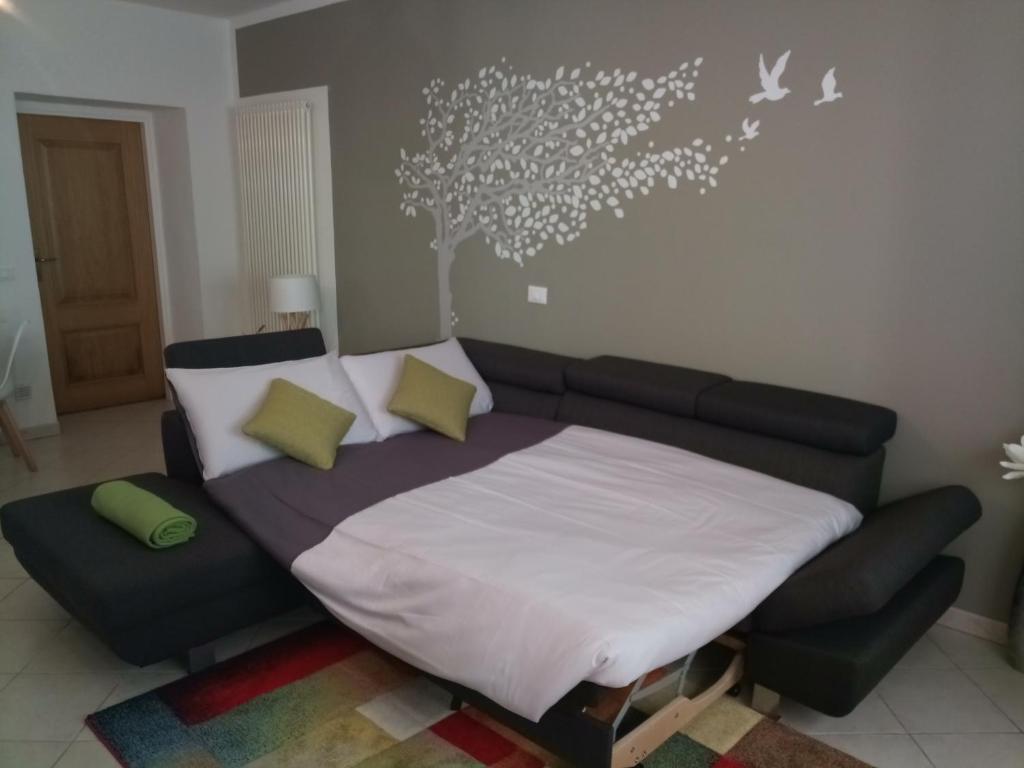 Postel nebo postele na pokoji v ubytování Bed & Bar Mini Apartment
