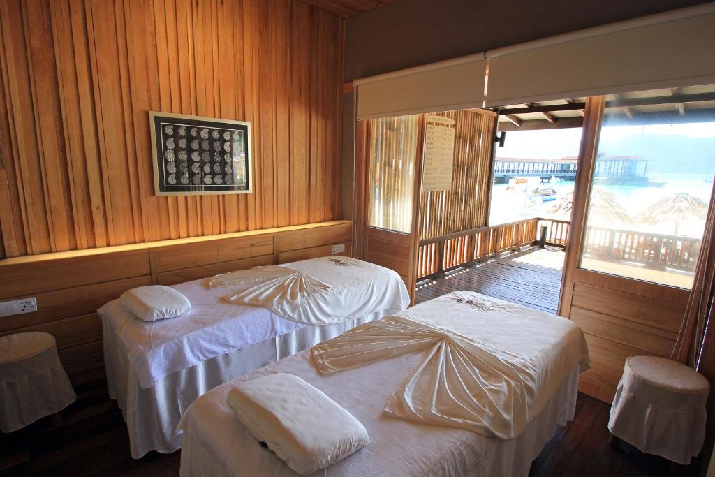 Postel nebo postele na pokoji v ubytování Bubu Resort