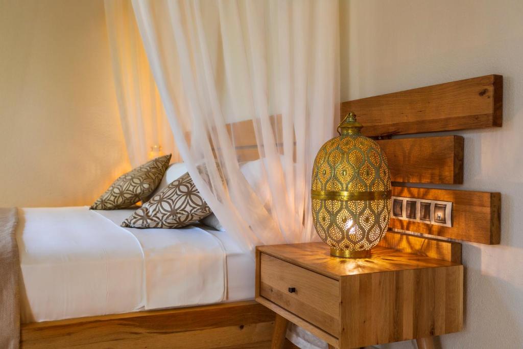 Postel nebo postele na pokoji v ubytování Ecclesia Hotel - Adult Only (+14)