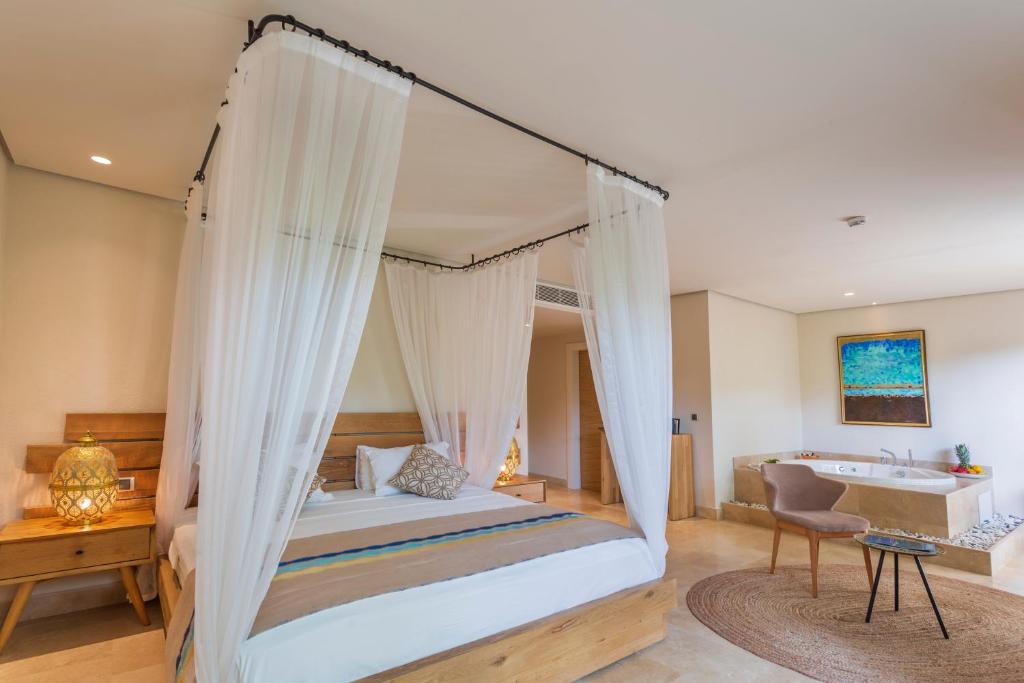 Postel nebo postele na pokoji v ubytování Ecclesia Hotel - Adult Only (+14)
