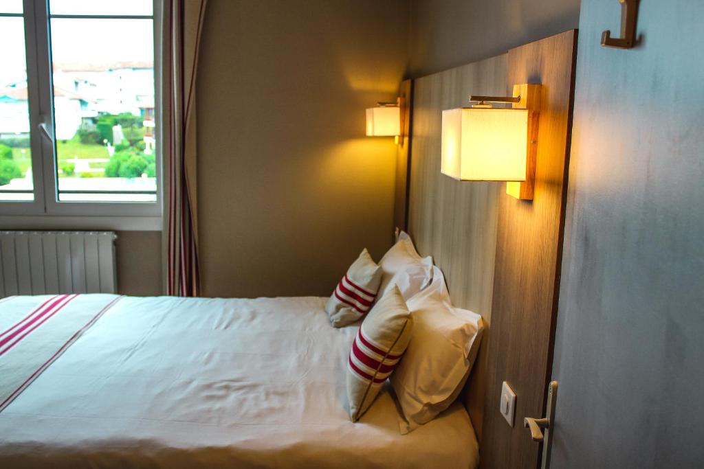 Postel nebo postele na pokoji v ubytování Hotel Agur Deneri