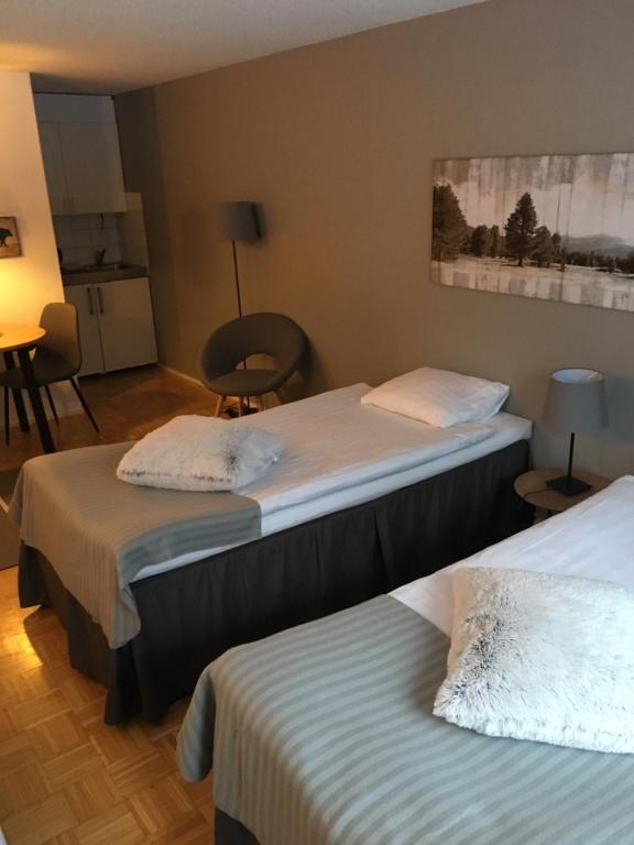 Postel nebo postele na pokoji v ubytování Hotel Yöpuu