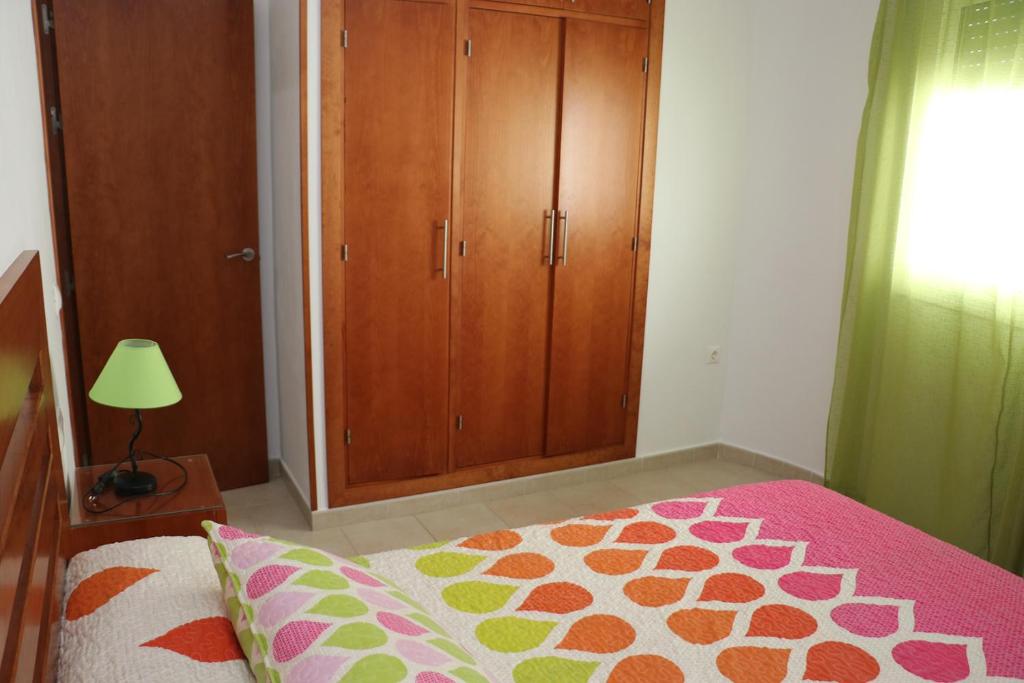 Postel nebo postele na pokoji v ubytování Apartamento central con aire acondicionado