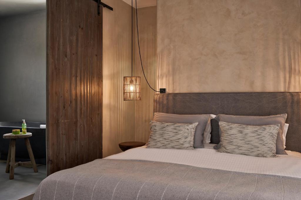 Posteľ alebo postele v izbe v ubytovaní Naxian Collection - Small Luxury Hotel of the World
