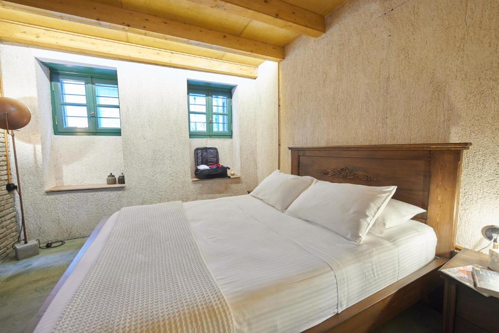 Posteľ alebo postele v izbe v ubytovaní Athenian Residences