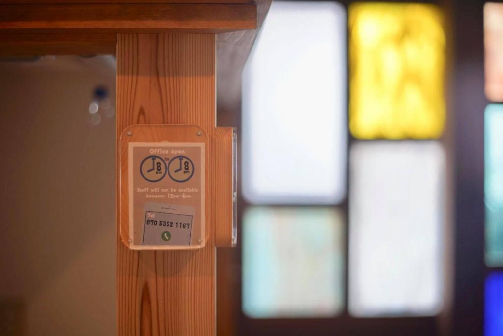 Certifikát, hodnocení, plakát nebo jiný dokument vystavený v ubytování Katsuo Guest House