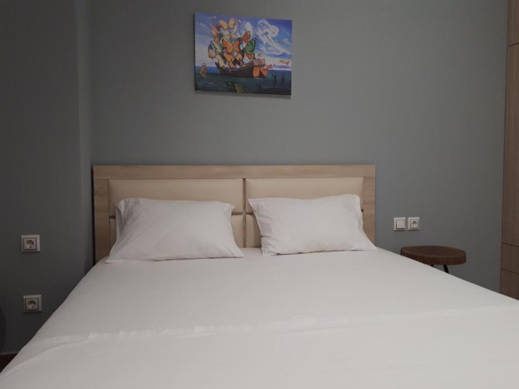 Postel nebo postele na pokoji v ubytování VIAL Rooms