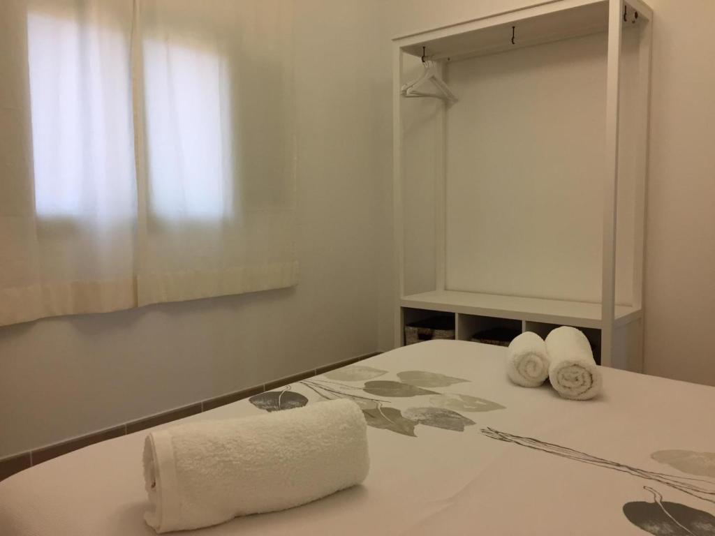 Postel nebo postele na pokoji v ubytování Es Magraner