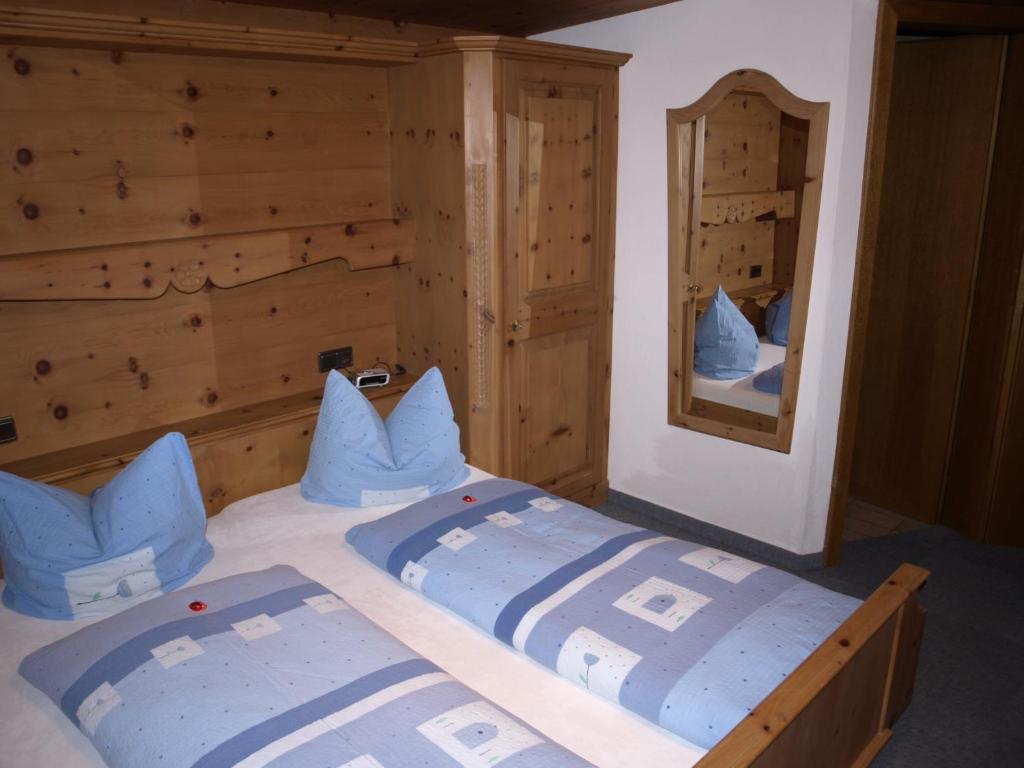 Postel nebo postele na pokoji v ubytování Gästehaus Christoph