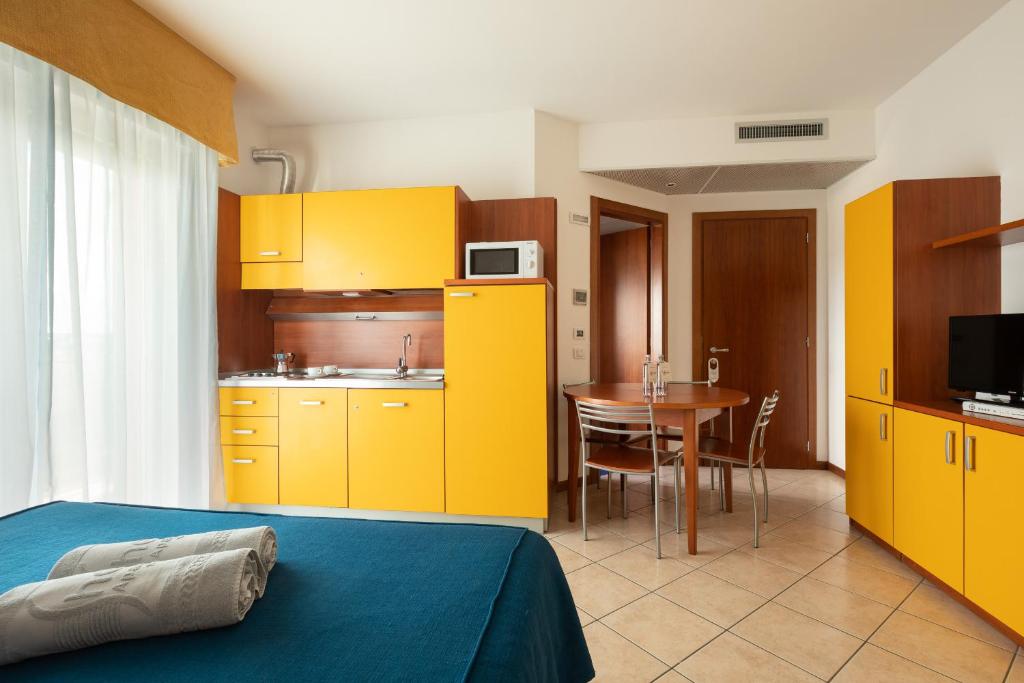 Kuchyň nebo kuchyňský kout v ubytování Hotel Sheila