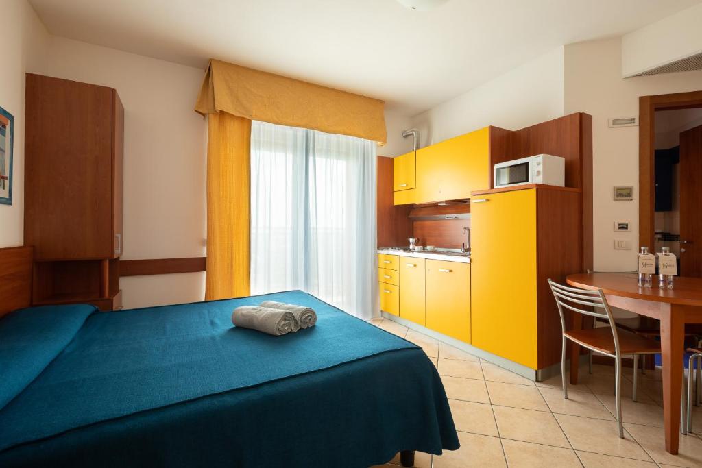 Kuchyň nebo kuchyňský kout v ubytování Hotel Sheila