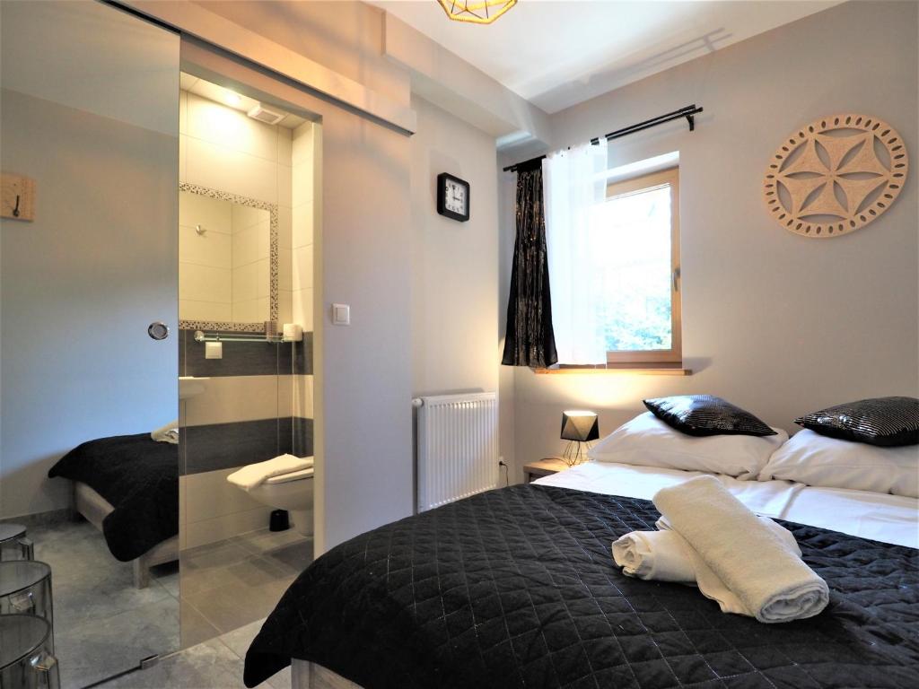Kúpeľňa v ubytovaní VIP Apartamenty FOLK RESIDENCE