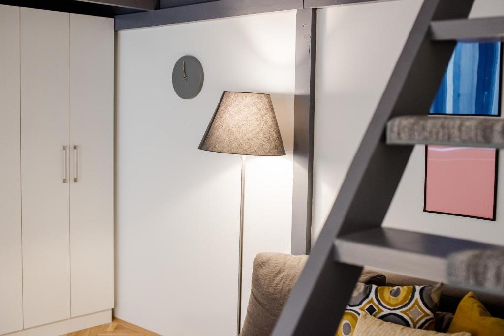 Postel nebo postele na pokoji v ubytování Rainbow Dream Apartment