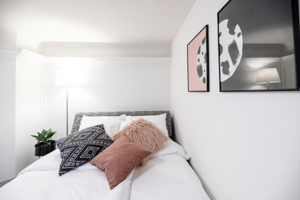 Postel nebo postele na pokoji v ubytování Rainbow Dream Apartment