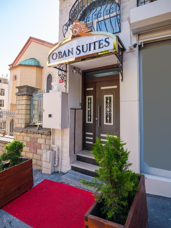a building with a sign that reads oxan suites at Oban Suites Istanbul in Istanbul