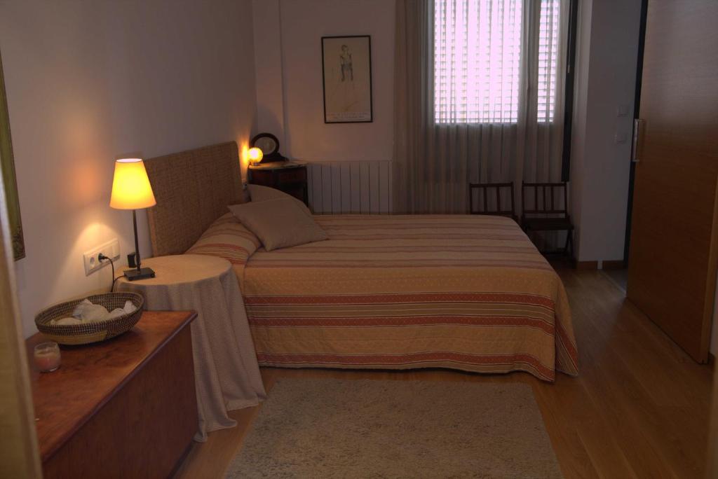 Postel nebo postele na pokoji v ubytování LLOGUER30 Bel's Home Bed&breakfast