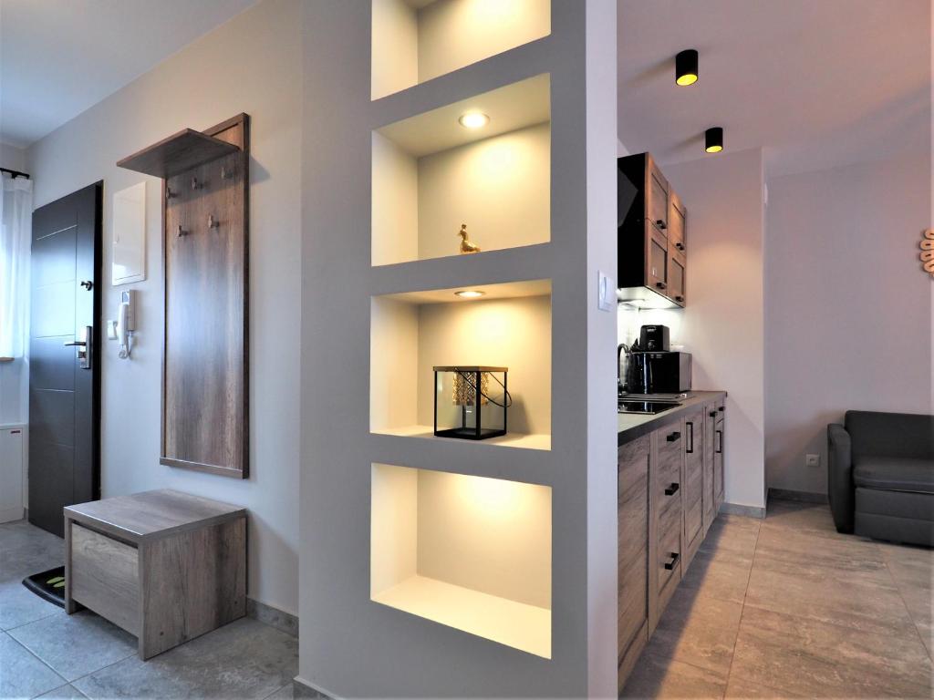 Kuchyňa alebo kuchynka v ubytovaní VIP Apartamenty FOLK RESIDENCE