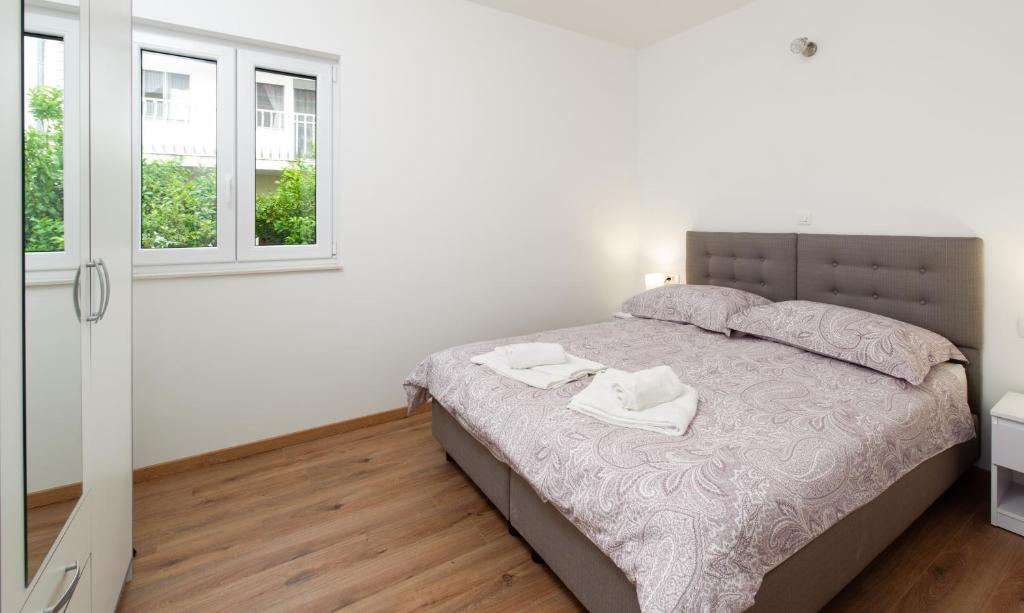 Postel nebo postele na pokoji v ubytování NERA lux apartment