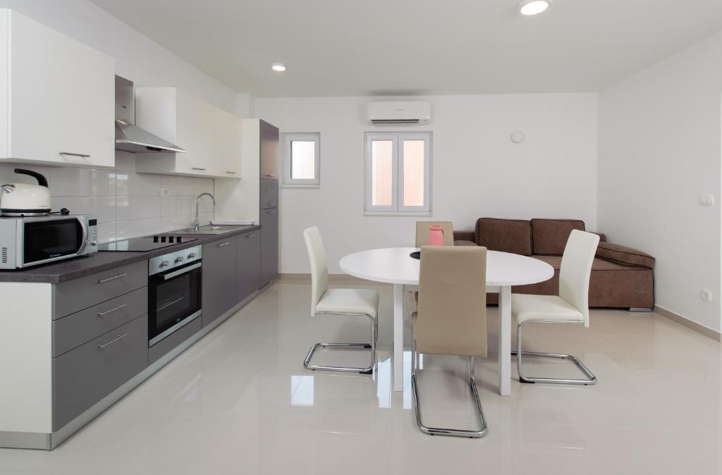 Kuchyň nebo kuchyňský kout v ubytování NERA lux apartment
