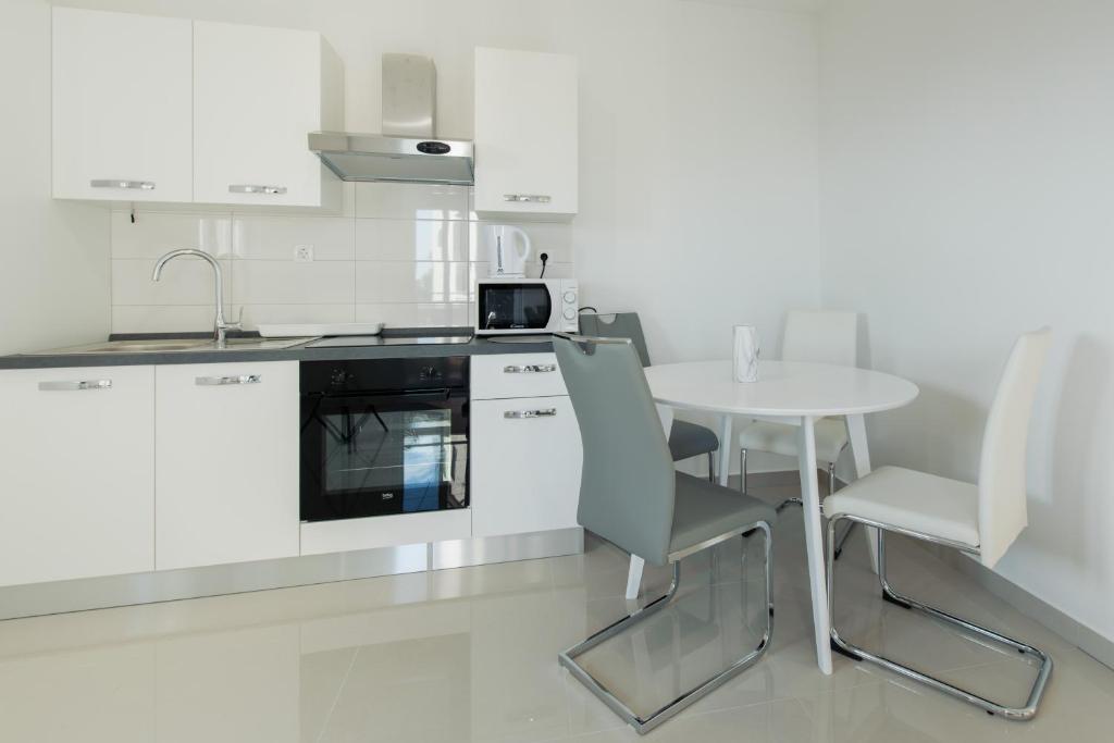 Kuchyň nebo kuchyňský kout v ubytování NERA lux apartment