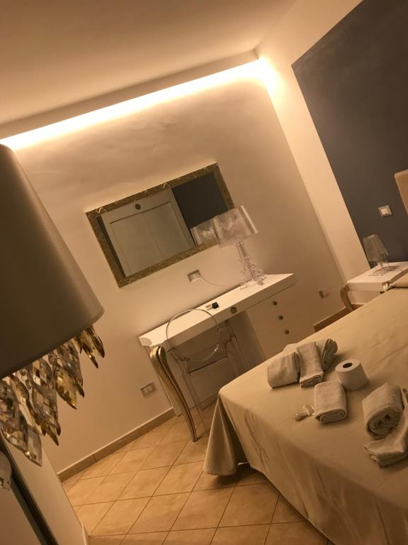 TV a/nebo společenská místnost v ubytování B&B Timpe Bianche