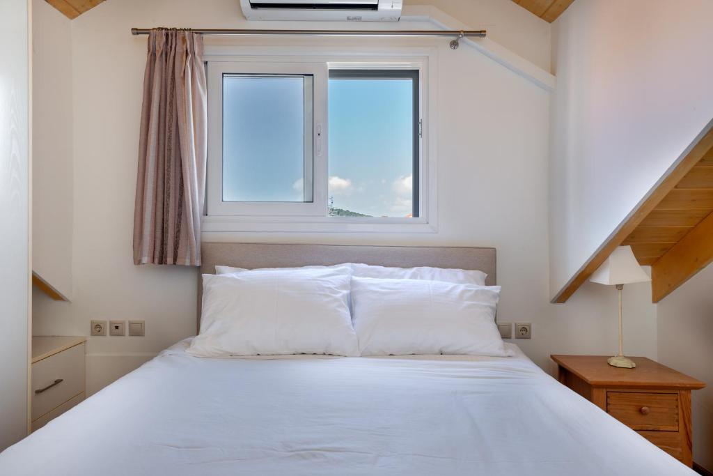 Posteľ alebo postele v izbe v ubytovaní Elegant Living
