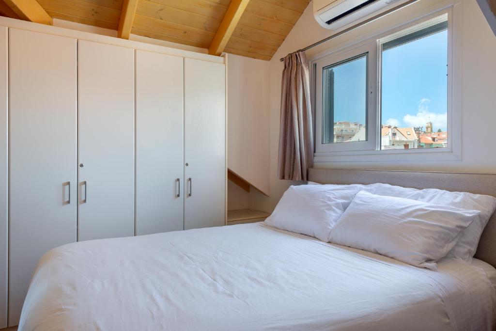 Posteľ alebo postele v izbe v ubytovaní Elegant Living