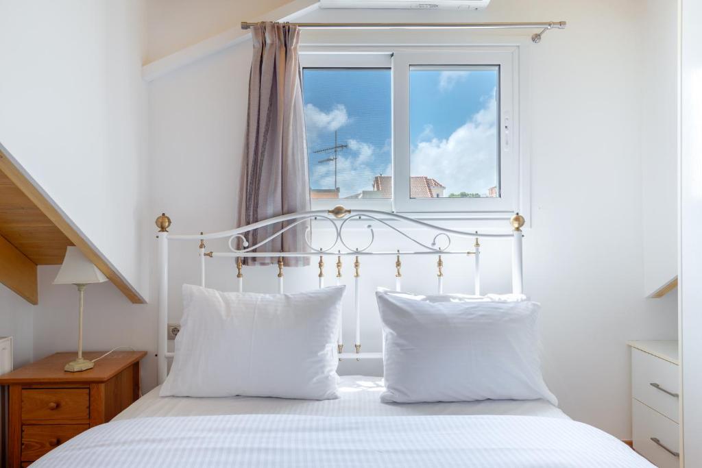 Posteľ alebo postele v izbe v ubytovaní Elegant Living