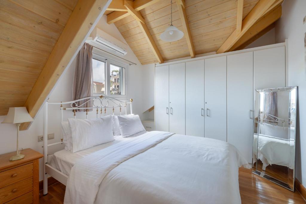 Posteľ alebo postele v izbe v ubytovaní Elegant Living