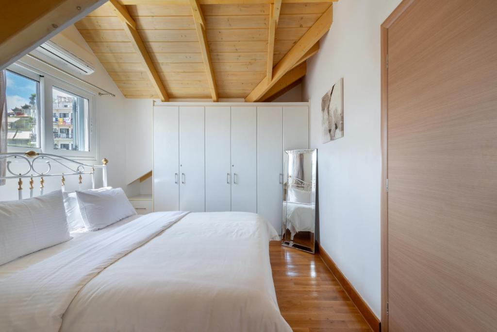 Posteľ alebo postele v izbe v ubytovaní Elegant Living