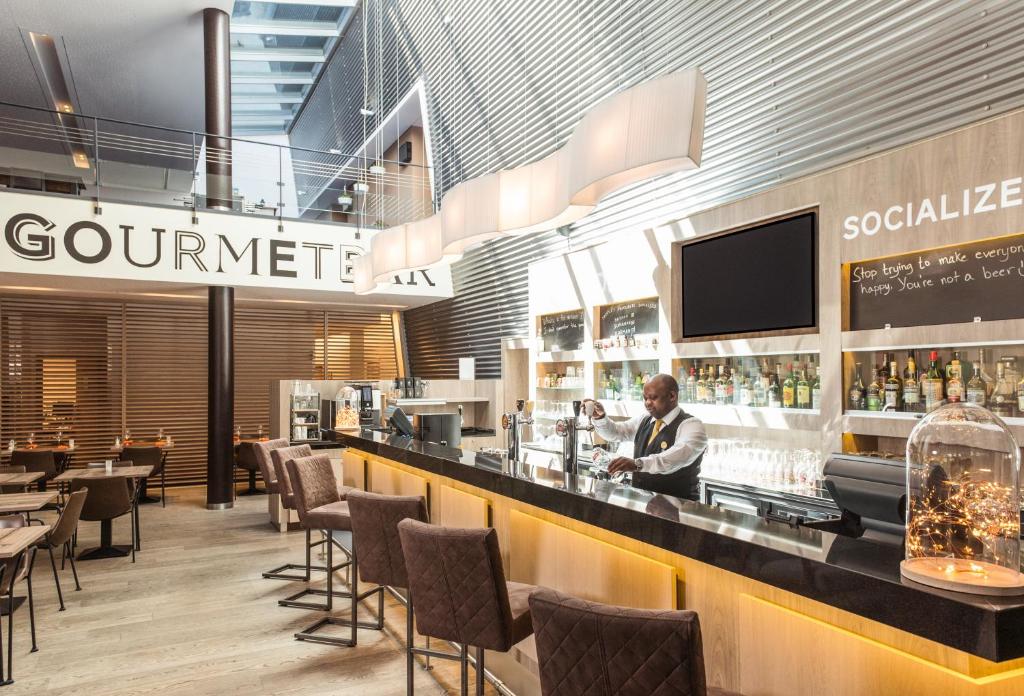 Lounge nebo bar v ubytování Novotel Mechelen Centrum