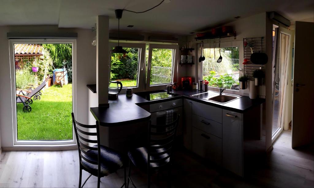 Kuchyň nebo kuchyňský kout v ubytování Arthouse Apartment 2