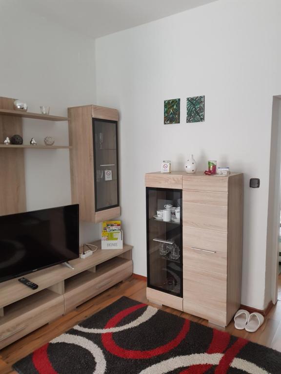 TV a/nebo společenská místnost v ubytování Privat Zimmer KF