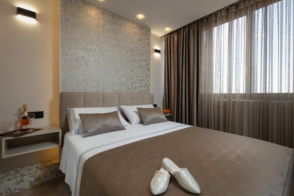 Posteľ alebo postele v izbe v ubytovaní Island View Apartment