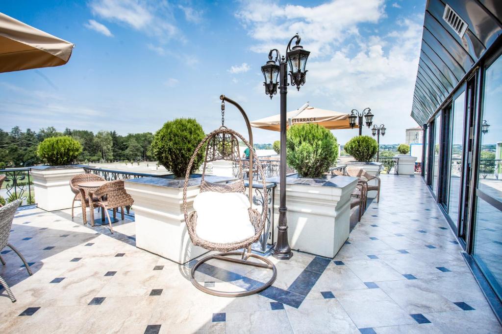 Balkón nebo terasa v ubytování Garden Palace