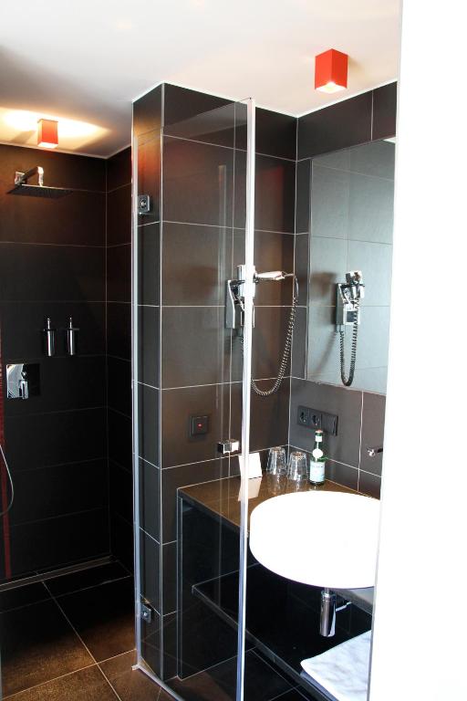 Koupelna v ubytování Hotel Grey