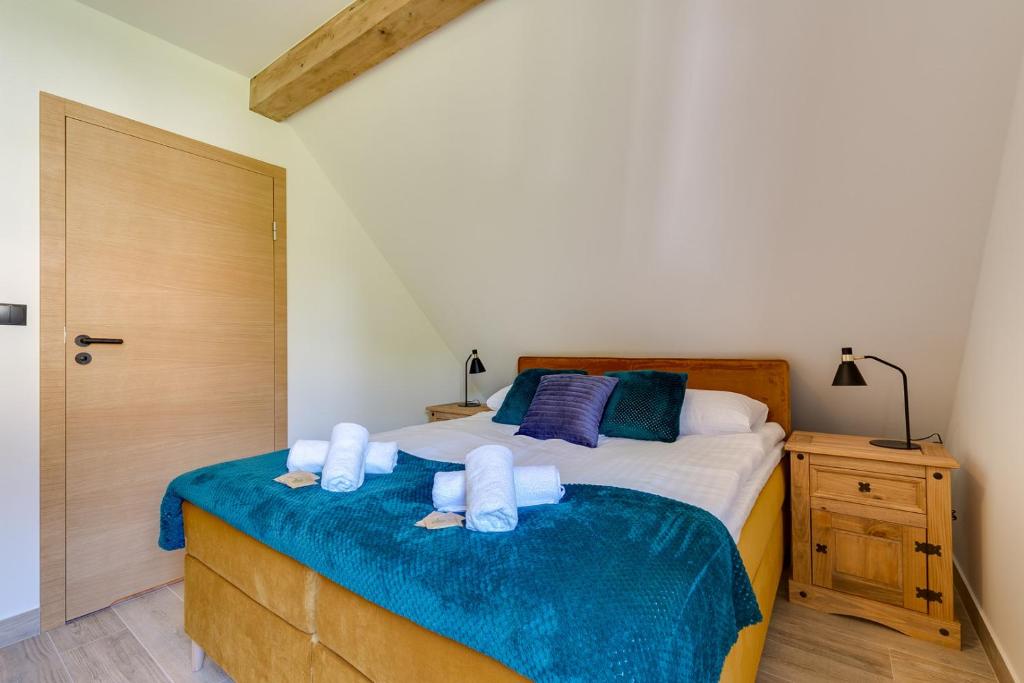 Posteľ alebo postele v izbe v ubytovaní Biała Owieczka B&B Szczyrk