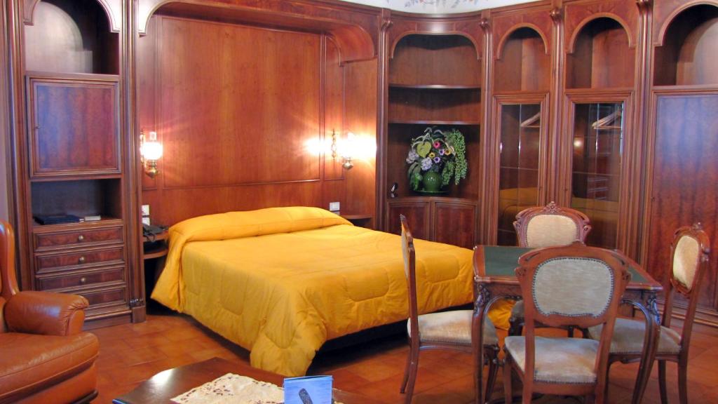Łóżko lub łóżka w pokoju w obiekcie Agriturismo Cassinazza