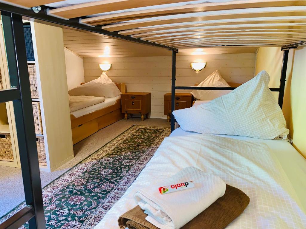 Postel nebo postele na pokoji v ubytování Haus Tirol