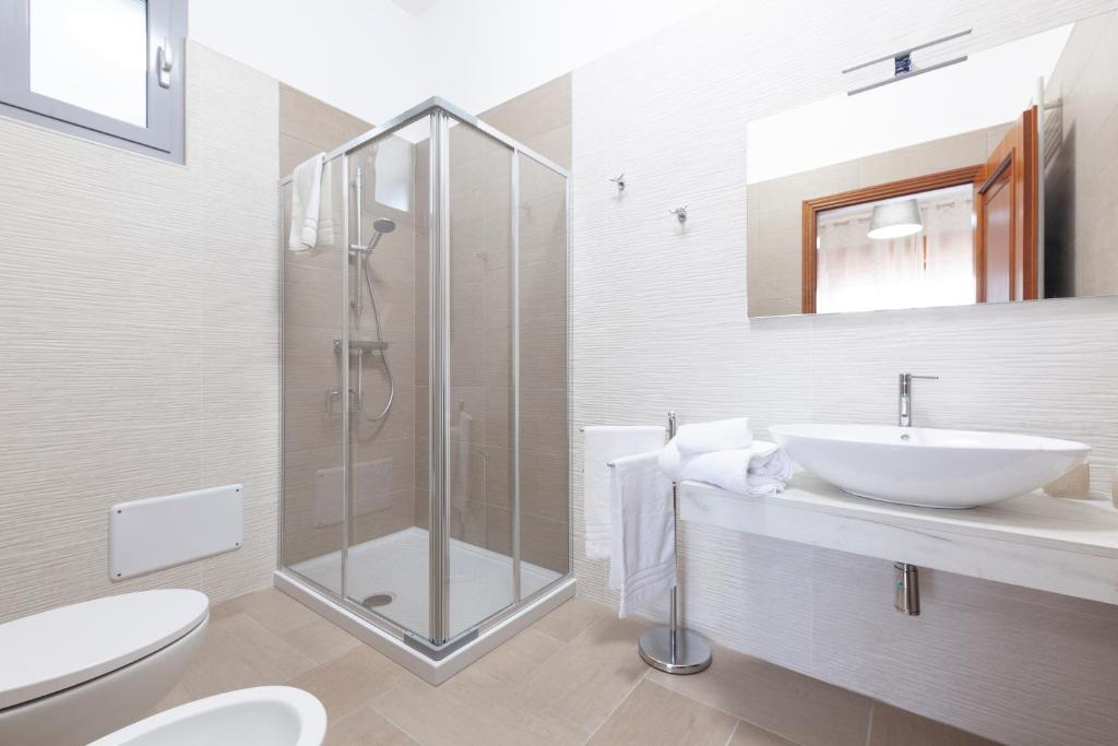 Koupelna v ubytování Lupomonaco Rooms